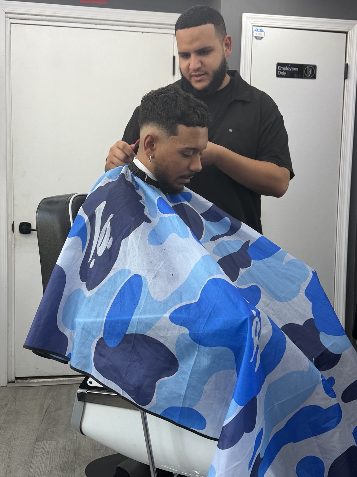 Luis cutting hair